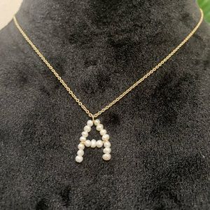 A initial necklace